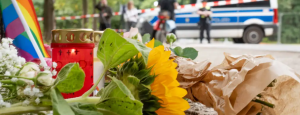 Flowers and candles in Berlin Tiergarten at the site of the attack